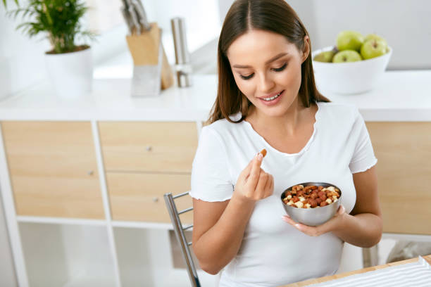 girl eating nuts